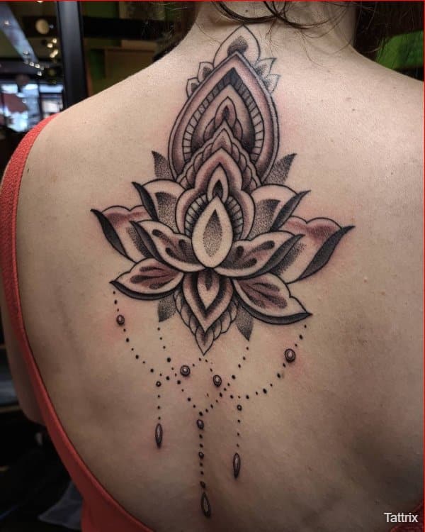 lotus tattoos on back for girls