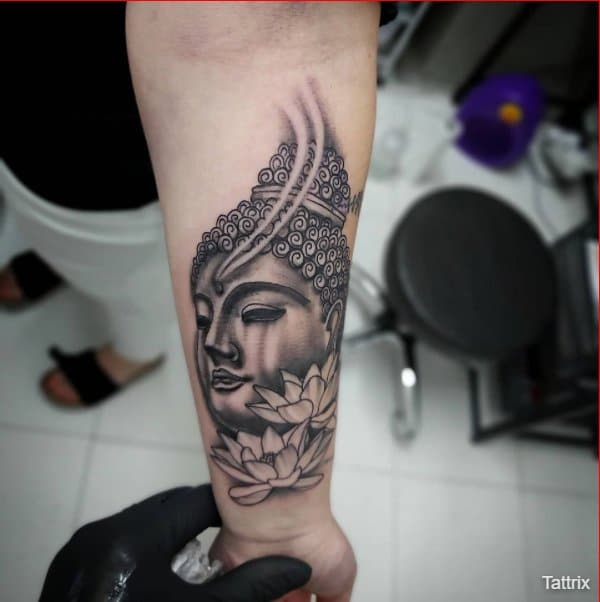 buddha with lotus tattoos