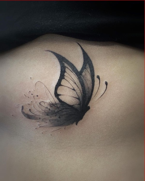 black and grey butterfly tattoos on back