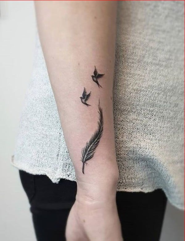 feather wrist tattoos for women