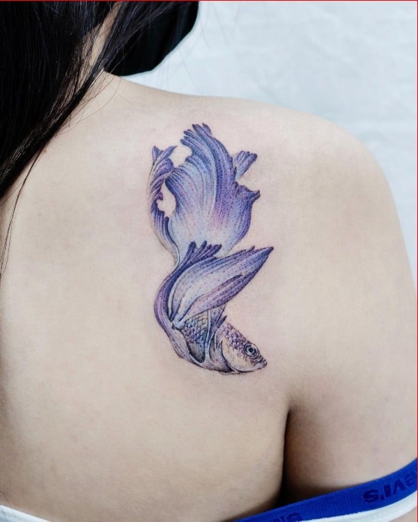 fish tattoos for women on upper back