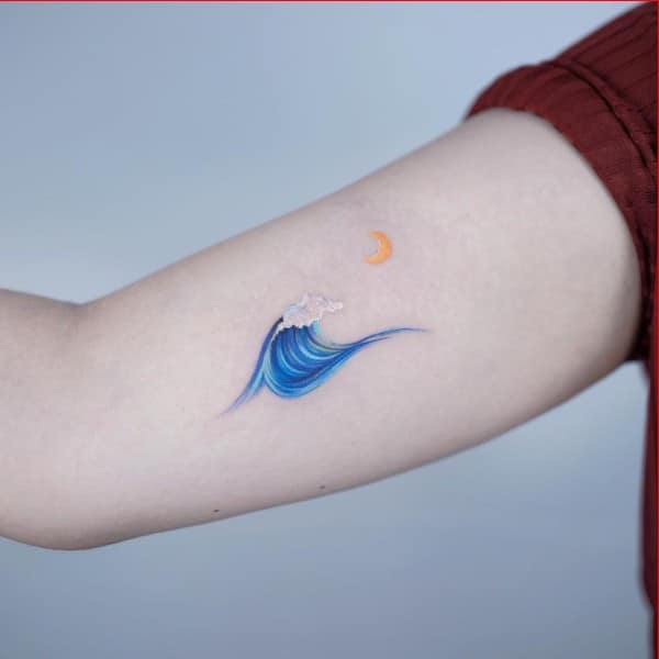 wave arm tattoos for women