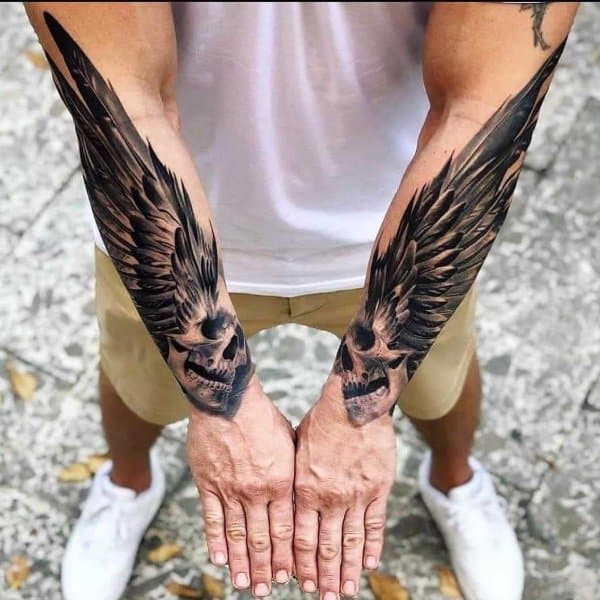 wings tattoos for men on wrist