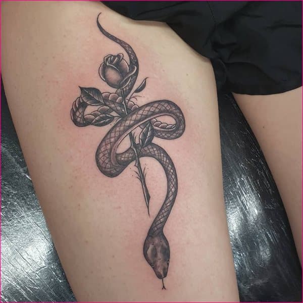 snake thigh tattoos