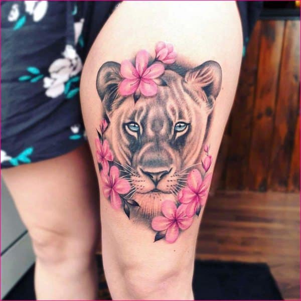 lioness front thigh tattoos