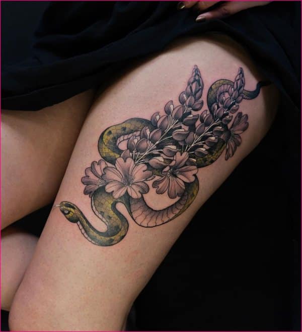 snake thigh tattoos for girls