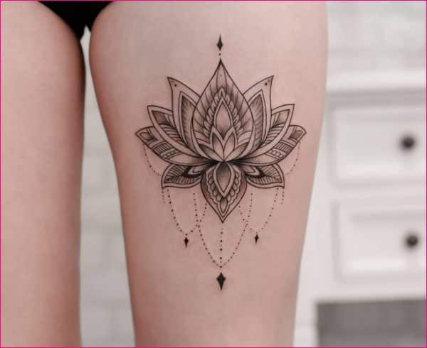 mandala flower thigh tattoos