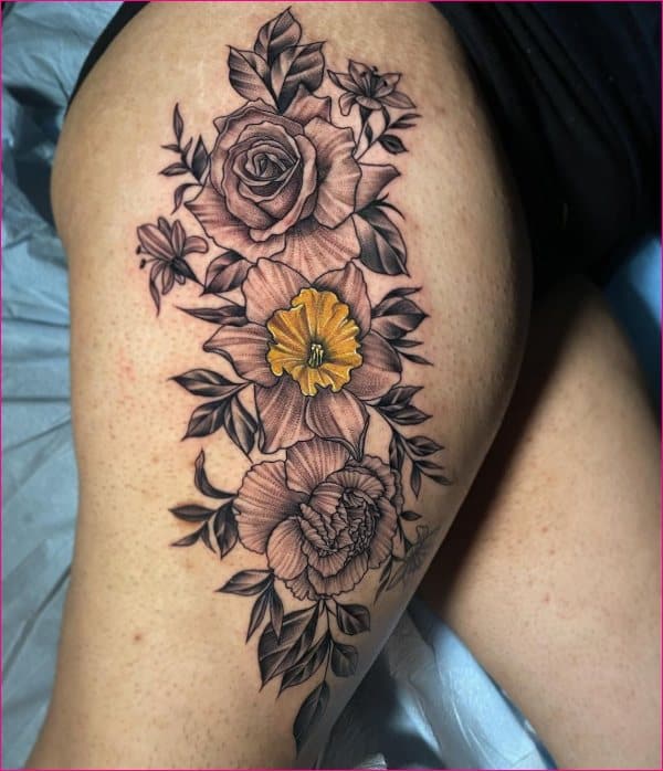 flower thigh tattoos