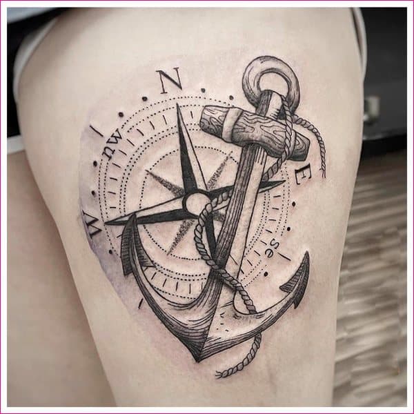anchor compass thigh tattoos