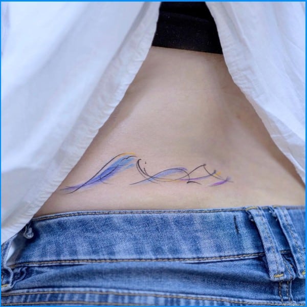 wave tattoos on lower back