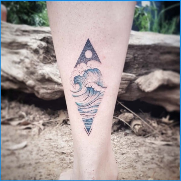 wave tattoos on legs