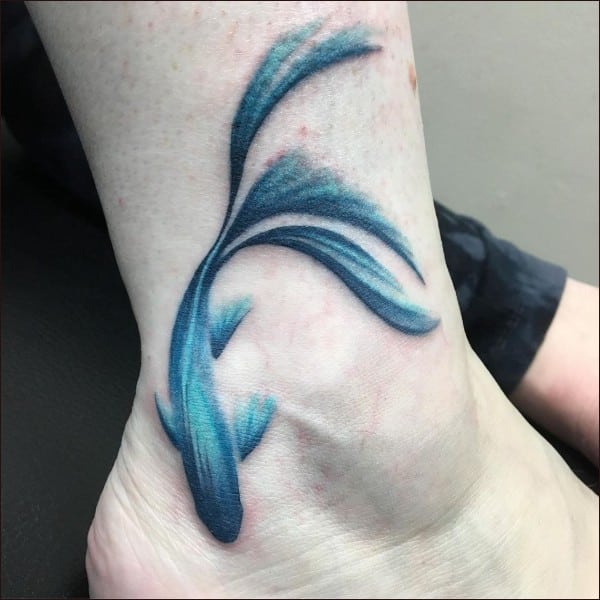 fish leg tattoos