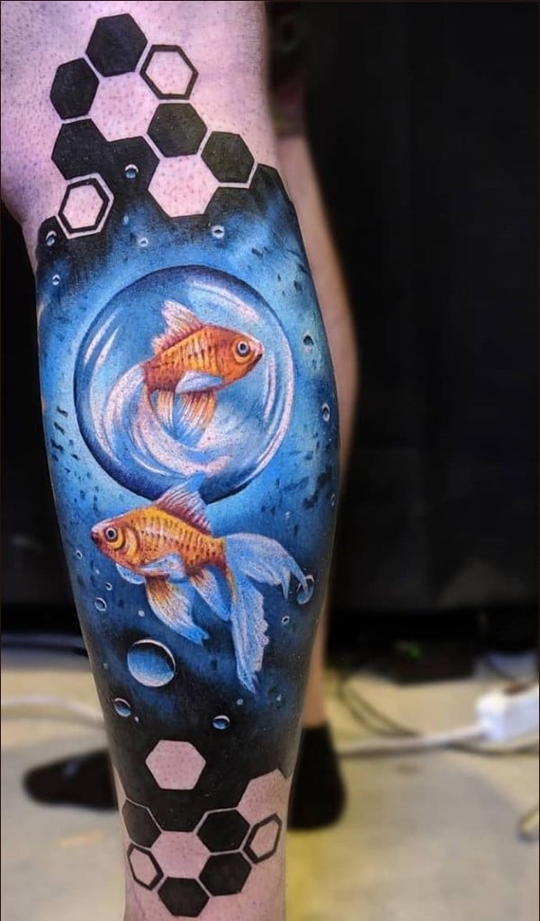 watercolor fish tattoos on leg