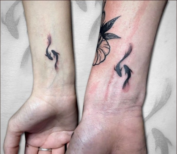 fish tattoos on wrist