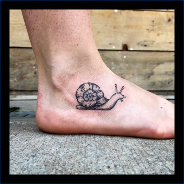 snail foot tattoos