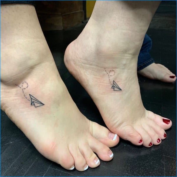couple matching foot tattoos