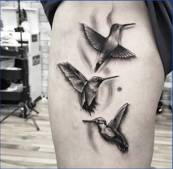 hummingbird thigh tattoos