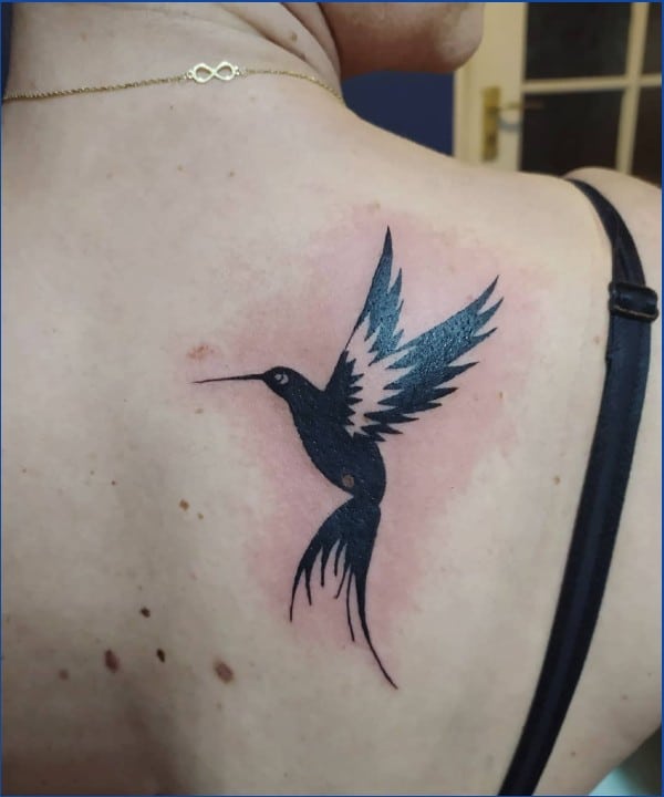 tribal hummingbird tattoos