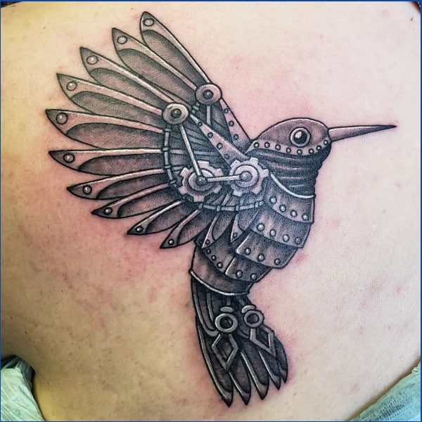 mechanical hummingbird tattoos on back