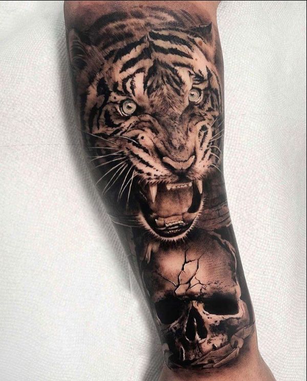 tiger with skull forearm tattoos