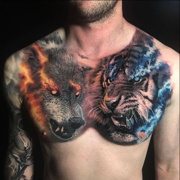 wolf and tiger tattoos on chest