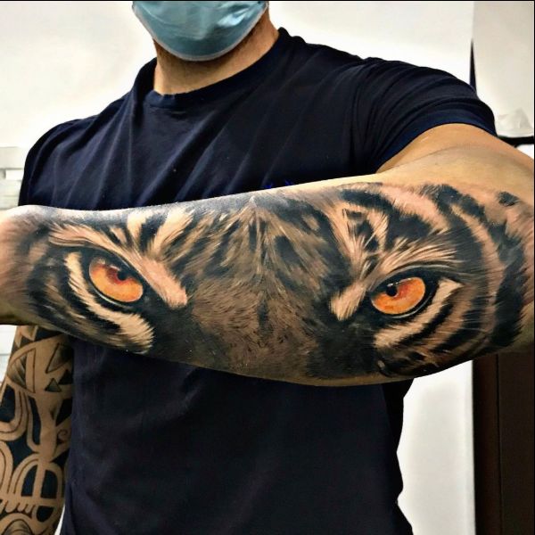 tiger eyes forearm tattoos